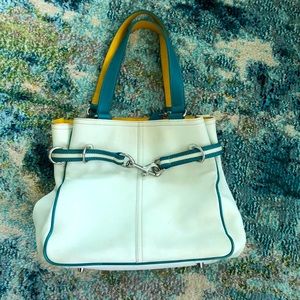 Coach leather purse. White, teal and yellow